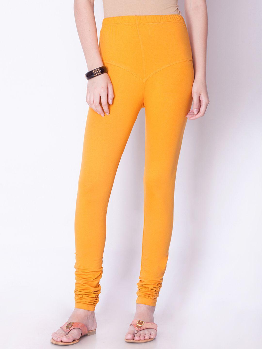 dollar missy women mustard orange solid churidar leggings