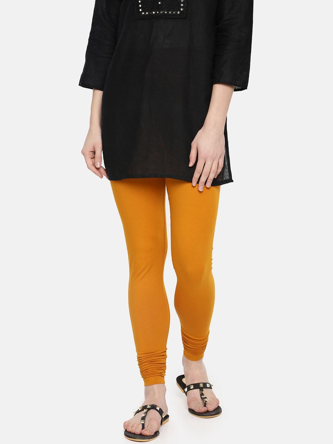 dollar missy women mustard orange solid churidar length leggings