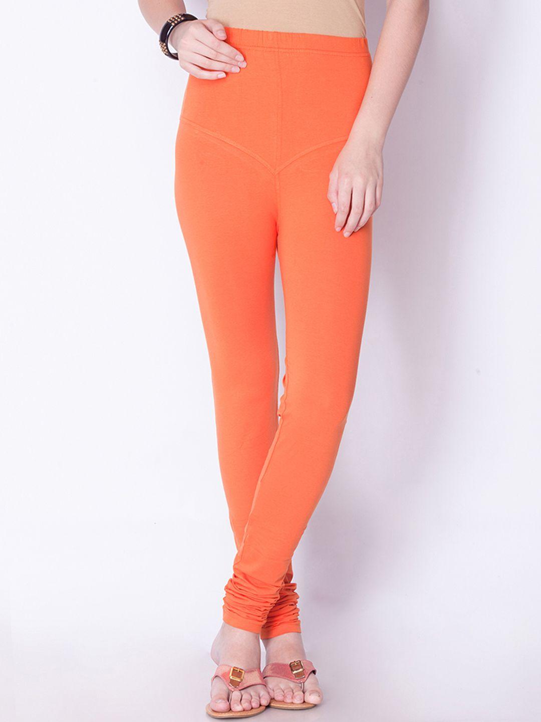 dollar missy women orange solid churidar leggings