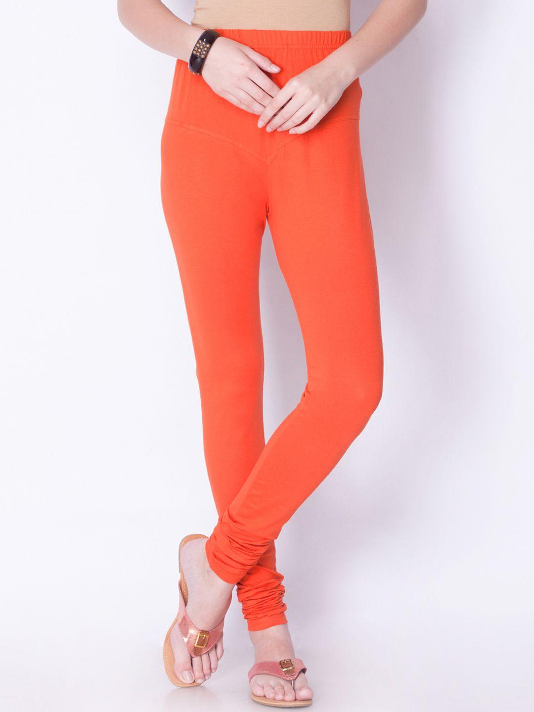 dollar missy women orange solid churidar leggings
