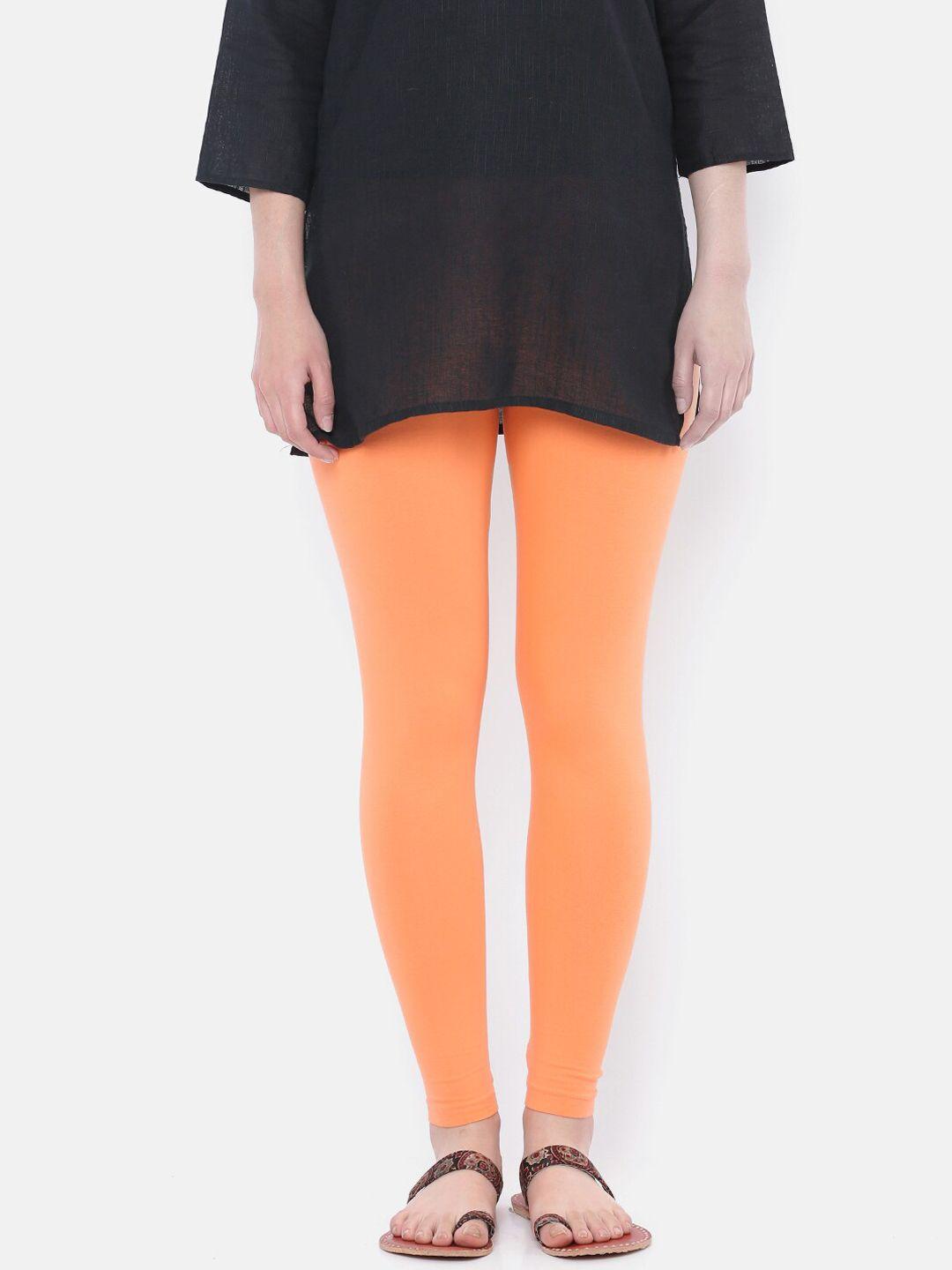 dollar missy women peach coloured solid ankle-length leggings