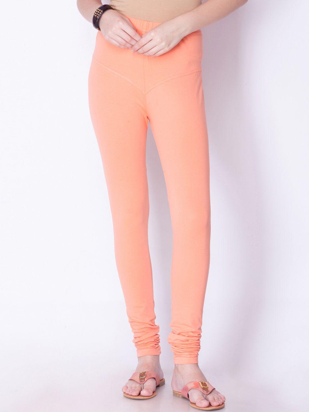 dollar missy women peach-coloured solid churidar leggings