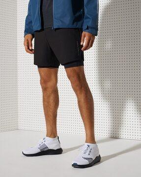 double layered mid-rise shorts