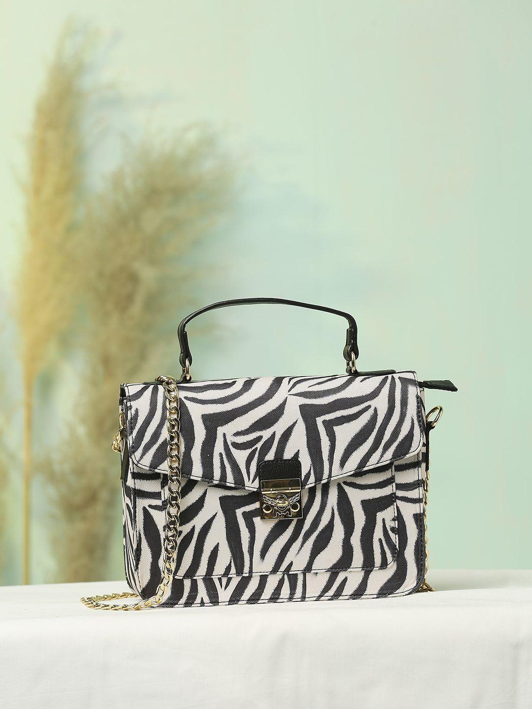 dressberry black printed swagger satchel with tasselled