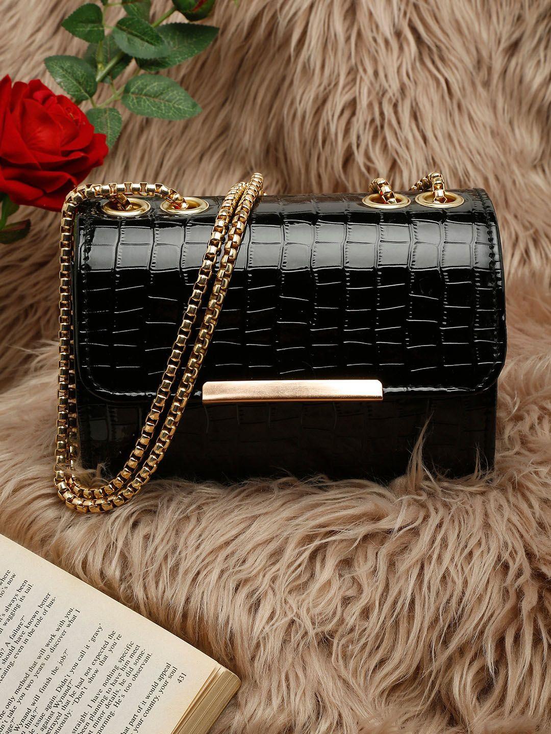 dressberry black textured structured handheld bag with fringed