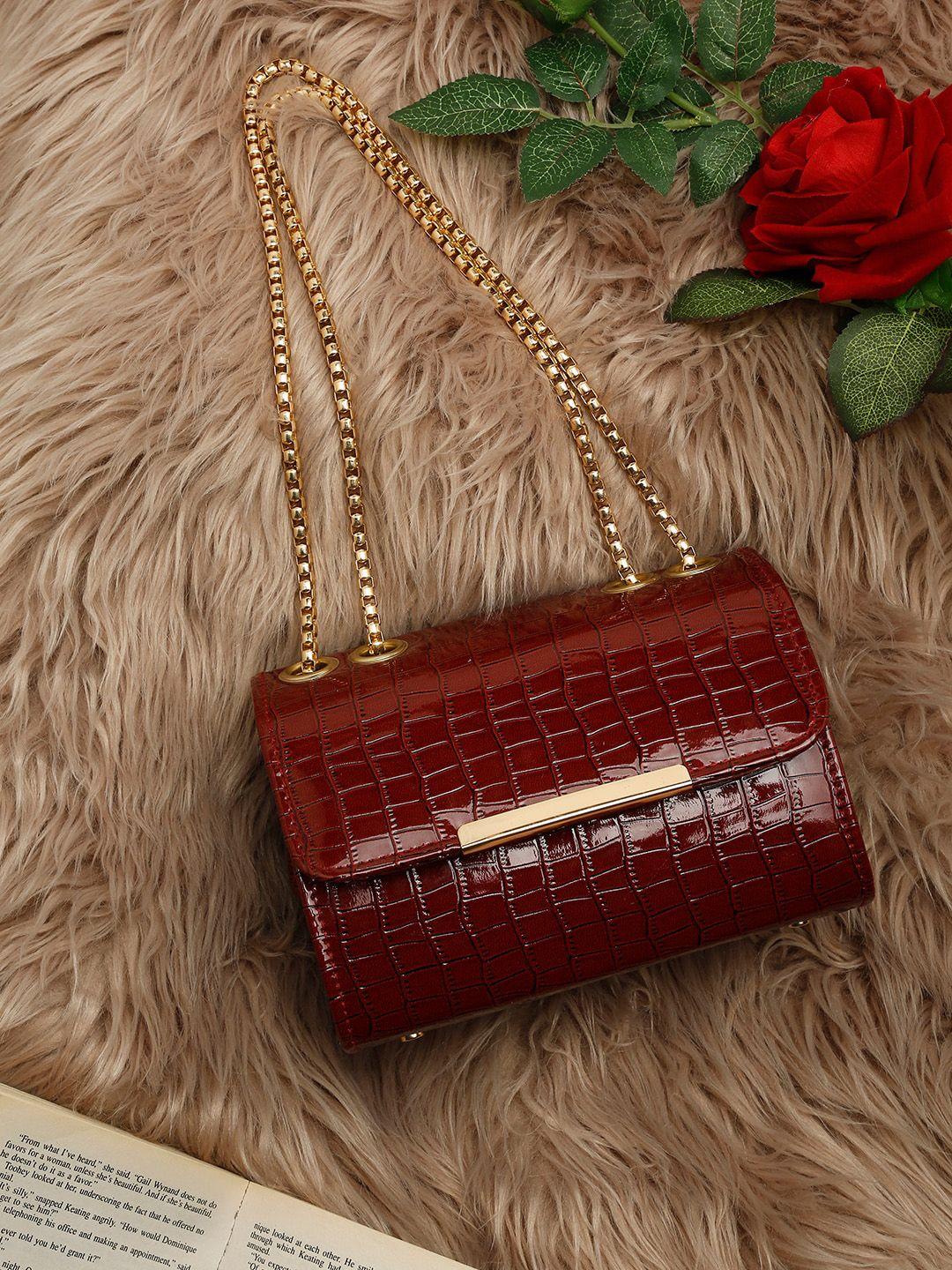 dressberry maroon textured structured sling bag with fringed