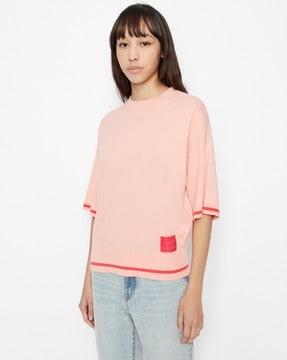 drop-shoulder pullover with satin logo patch