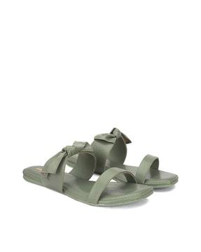 dual-strap slip-on flat sandals with bow accent