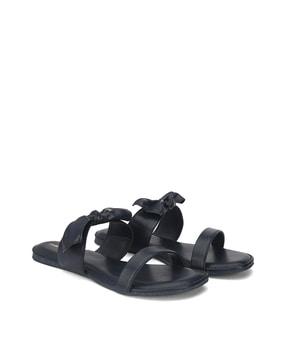 dual-strap slip-on flat sandals with bow accent