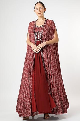 dusky red embroidered gown with cape