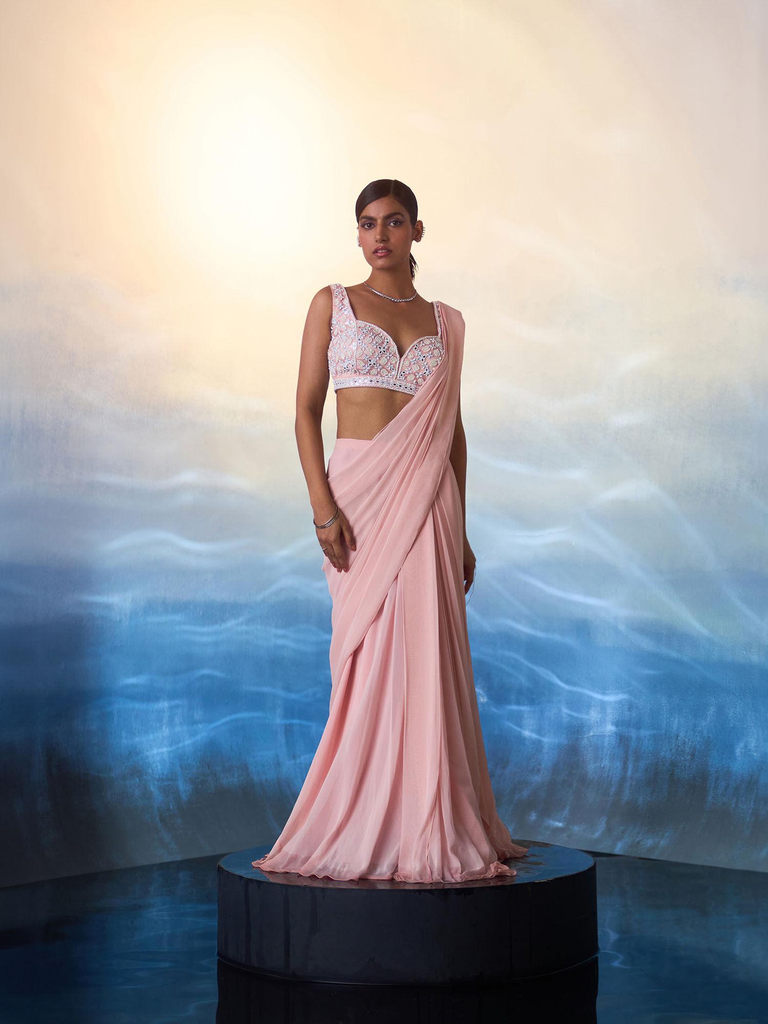 dusty peach georgette drape saree with stitched blouse