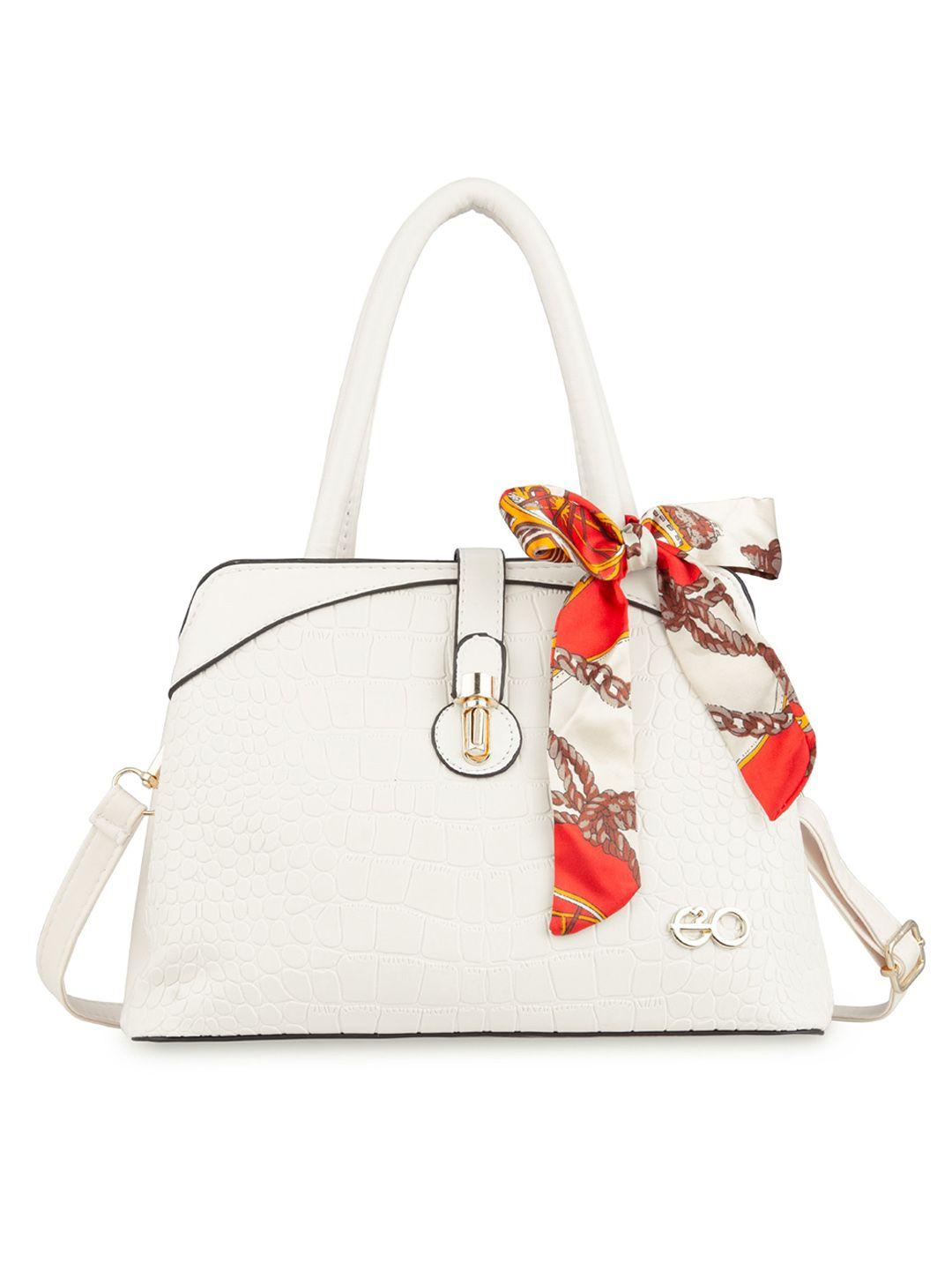 e2o white pu structured handheld bag with tasselled