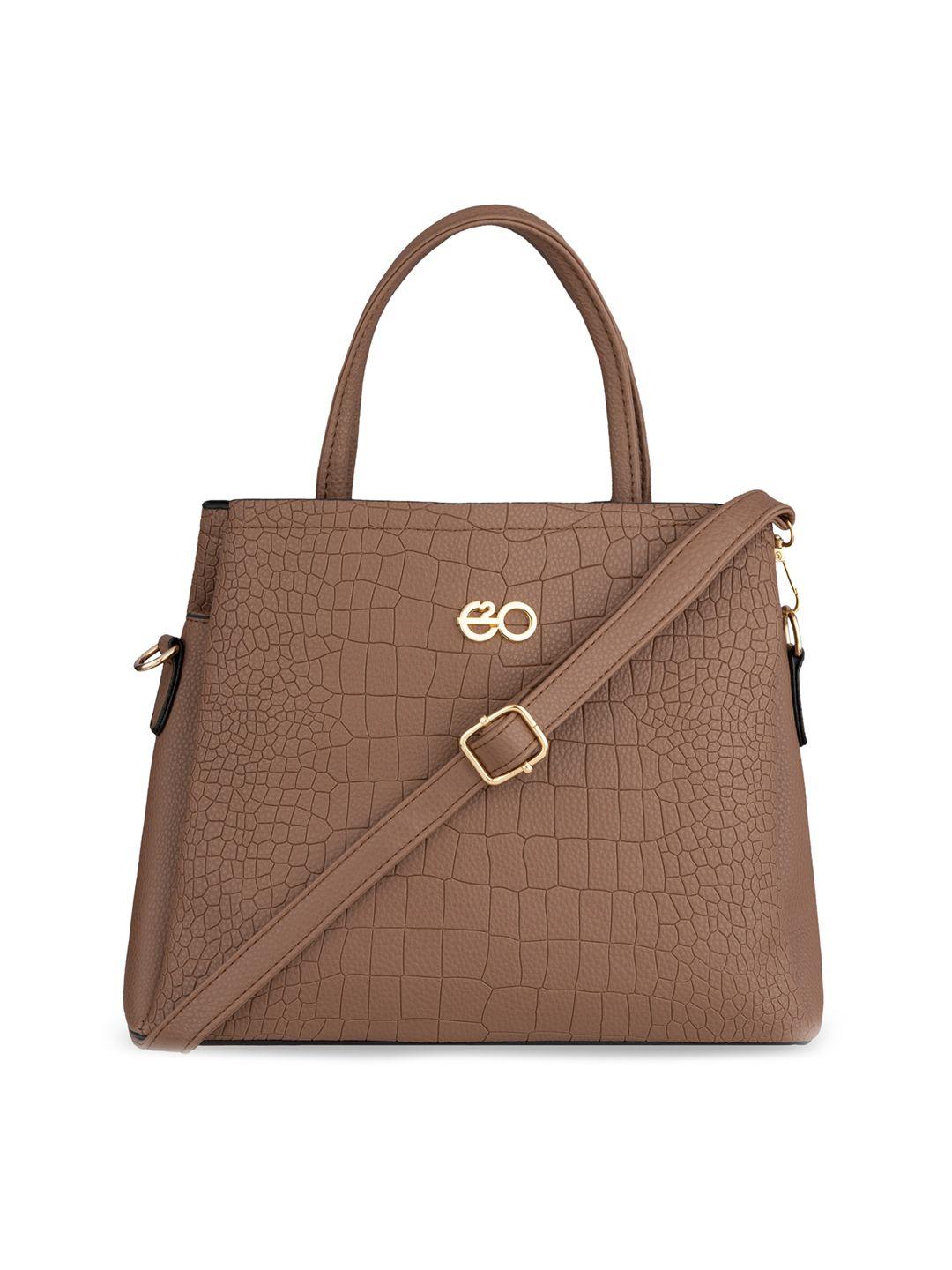 e2o women brown textured structured handheld bag with cut work handbag