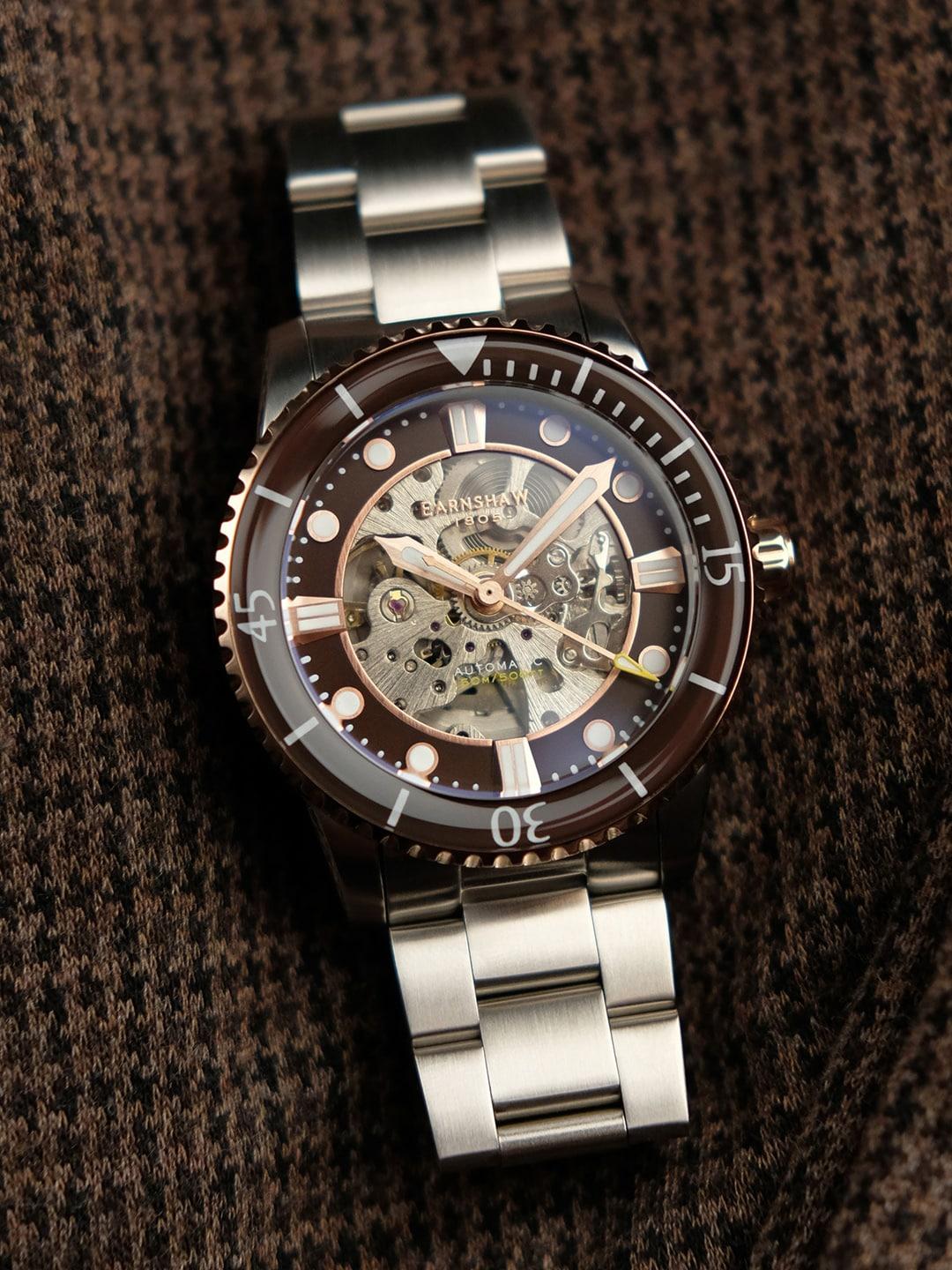 earnshaw men brass skeleton dial & stainless steel bracelet style analogue watch-es-8185