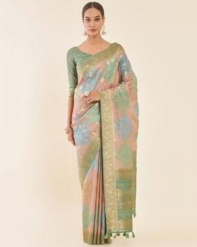 earth tussar saree with woven floral zari designs and motifs saree