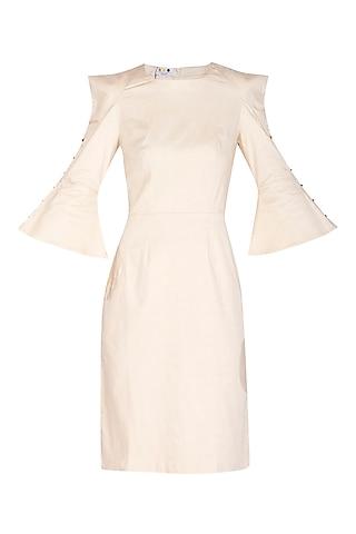 ecru dress with sharp shoulders