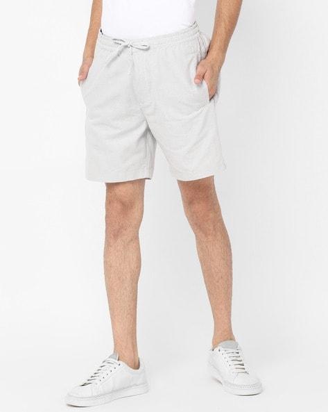 edit taper striped shorts with insert pockets