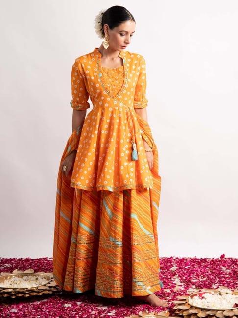 ekohum orange bandhani print kurta with leheriya print skirt and dupatta