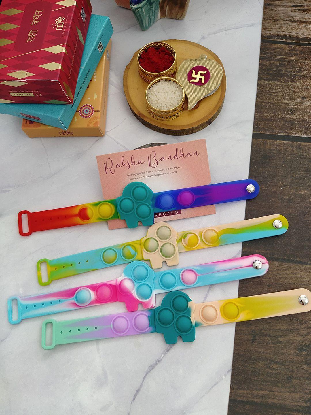 el regalo pack of 4 kids patterned rakhi with roli chawal