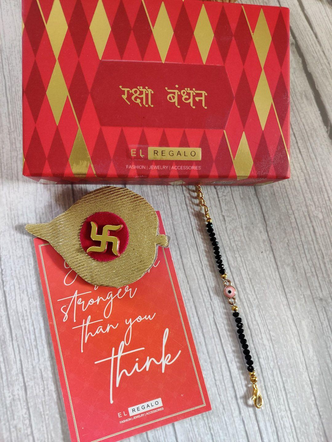 el regalo pink & gold coloured evil eye wrap around rakhi with roli chawal & raksha bandhan greeting card