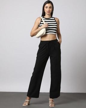 elasticated trousers with side pockets