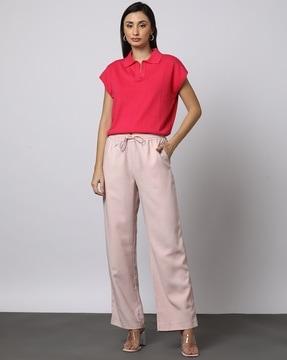 elasticated trousers with side pockets