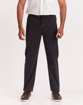 elasticated waist pleated trousers