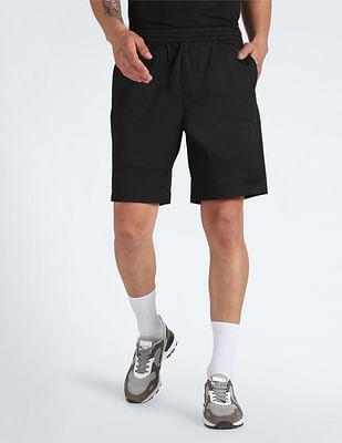 elasticised waist solid shorts