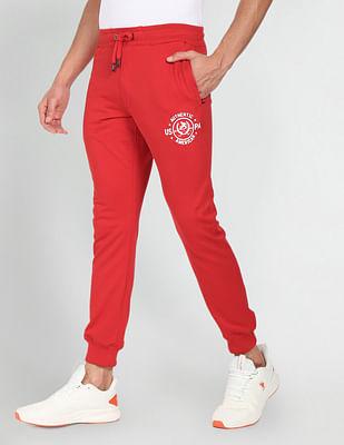 elasticised waist brand print joggers