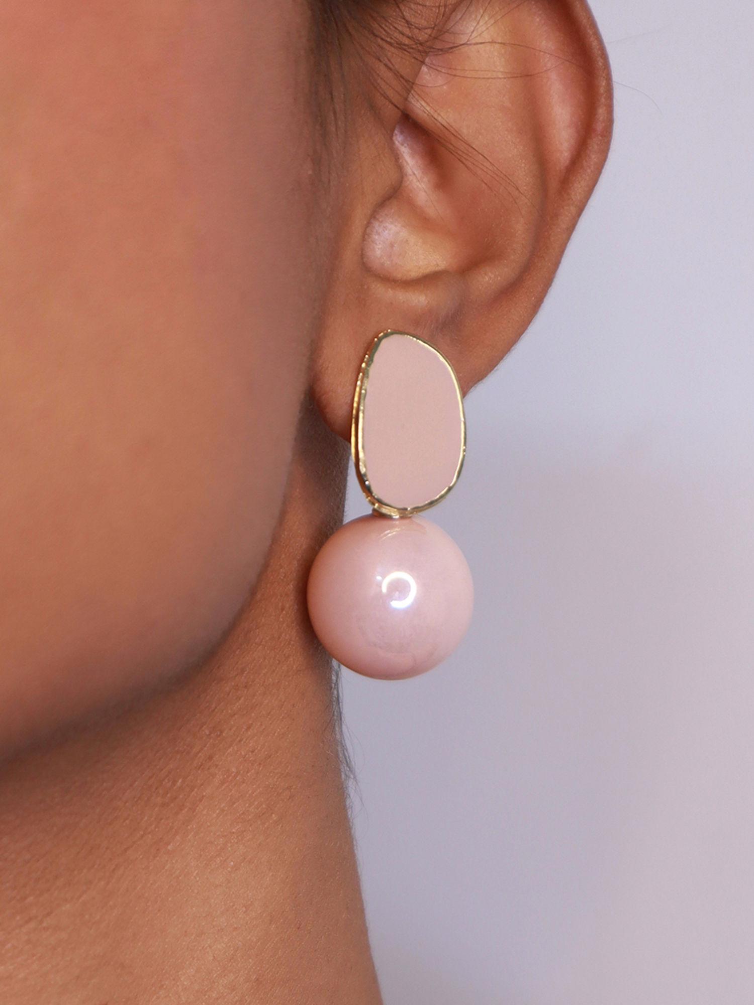 elegant pearl and rose gold dangler earrings
