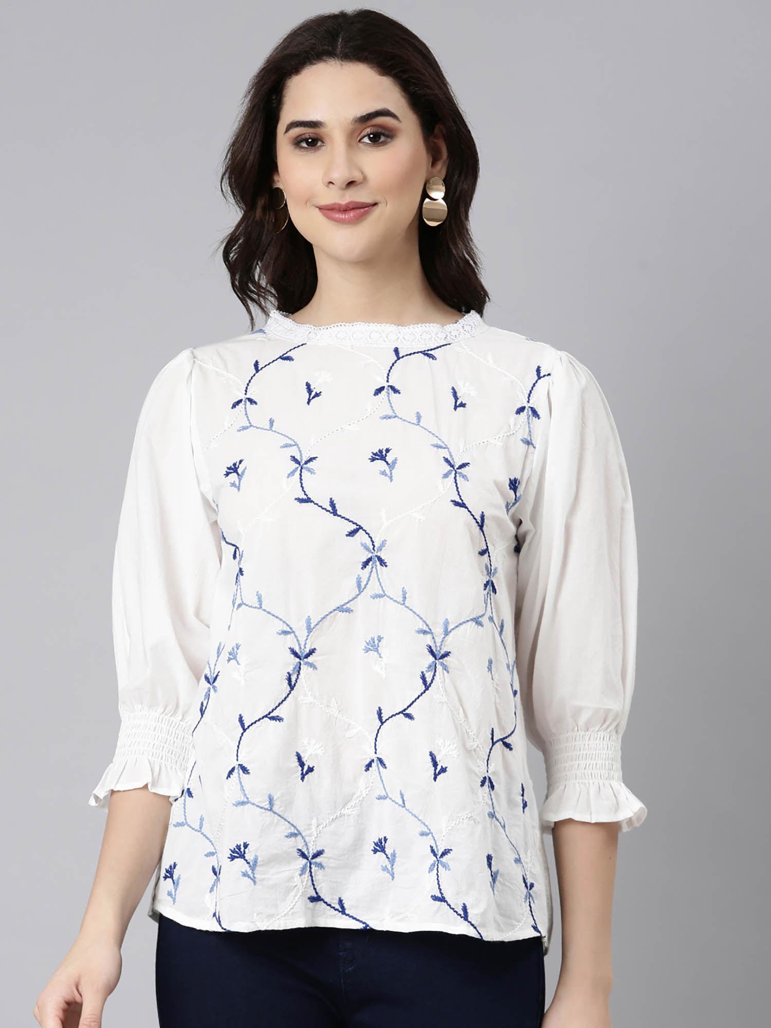 elegant white cotton top with embroidery