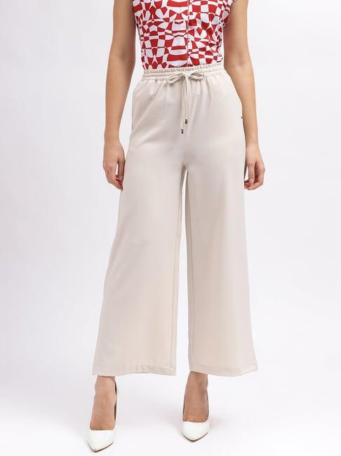 elle beige relaxed fit mid rise trousers