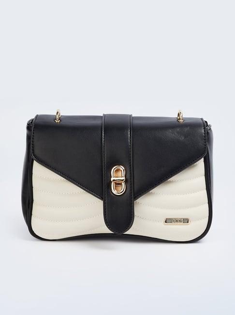 elle black & white textured sling handbag