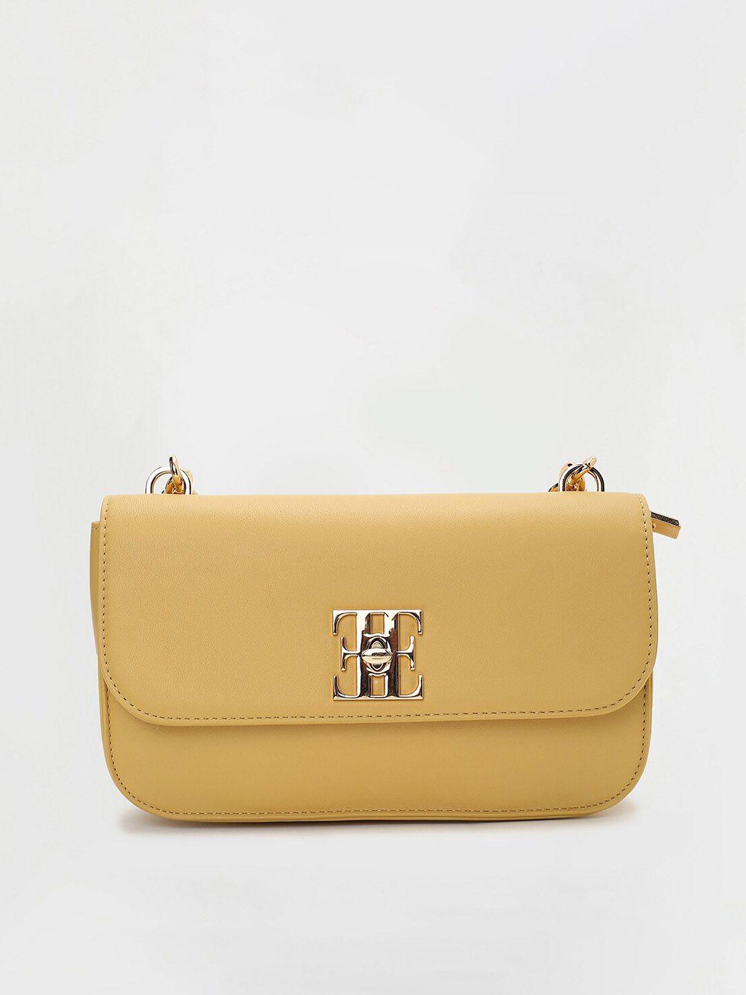 elle textured structured sling bag