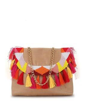 embellished clutch with tassels