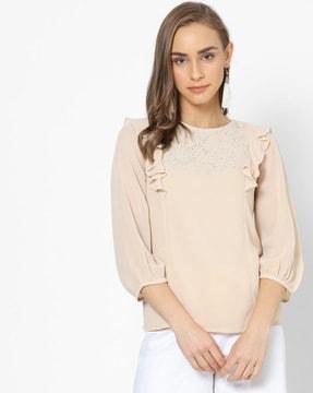 embellished round-neck top with ruffled panels