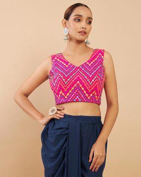 embellished back open sleeveless blouse