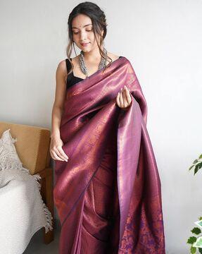 embellished banarasi silk saree with border