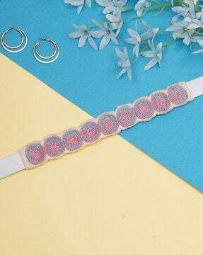 embellished belt with button closure