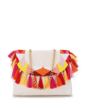 embellished clutch with tassels