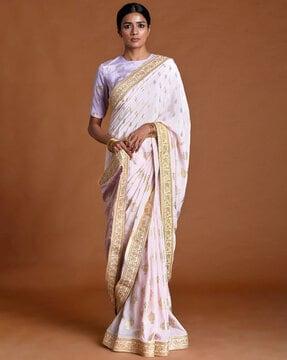 embellished crepe saree with blouse piece