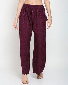 embellished flared palazzos with drawstring waist