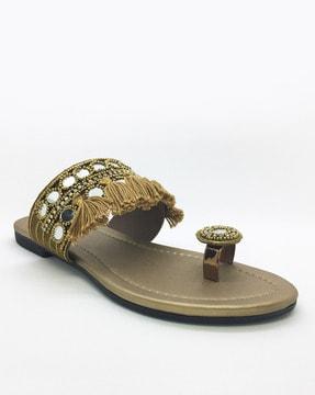 embellished flat sandals with tassels detail