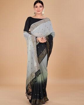 embellished georgette saree with tassels