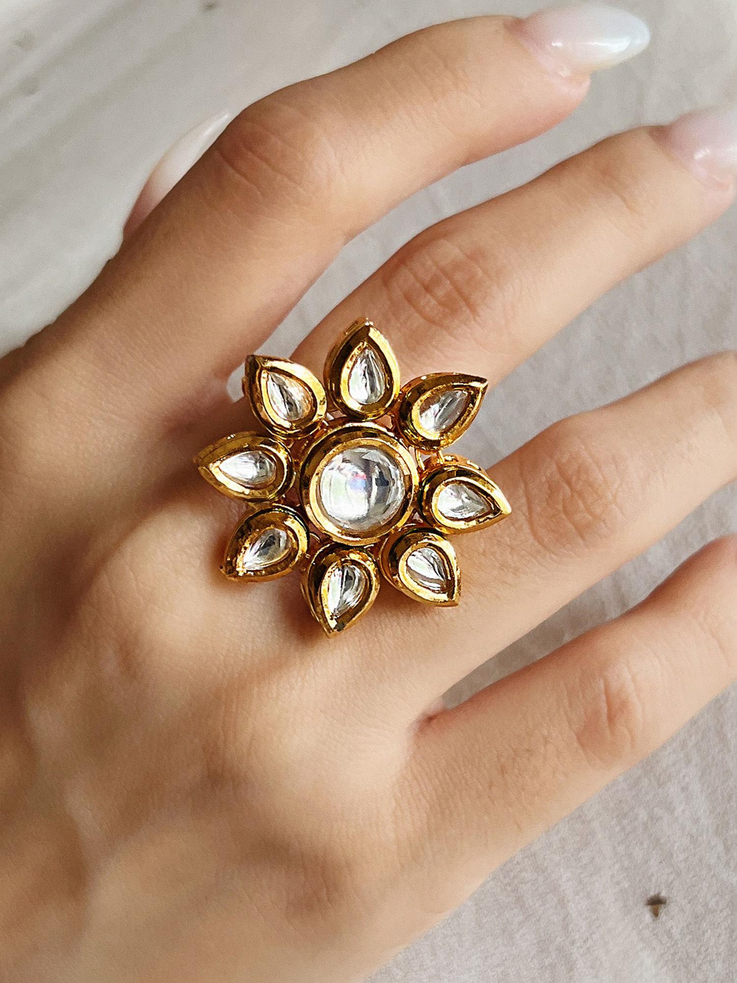 embellished gold flower ring with kundan stone