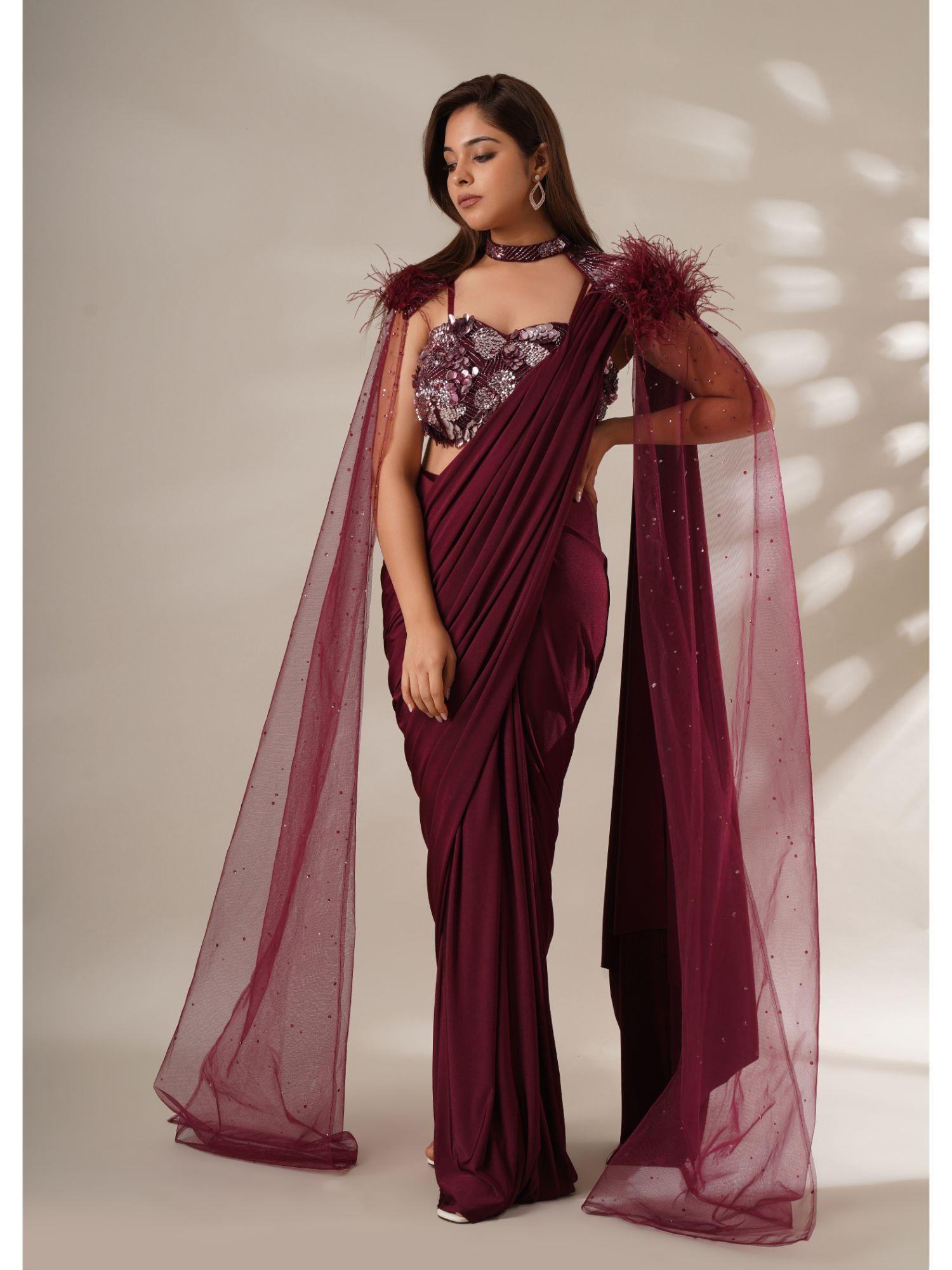 embellished maroon pre-drape saree with stitched blouse and cape