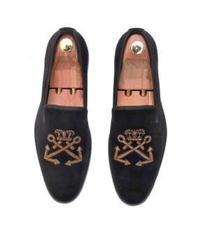 embellished round-toe slip-on shoes