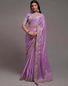 embellished saree with patch border