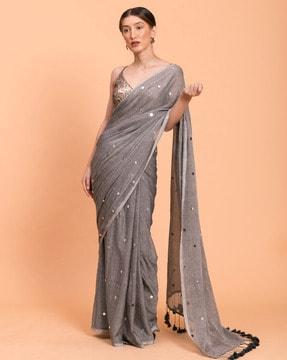 embellished saree with tassels