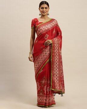 embellished saree with tassels